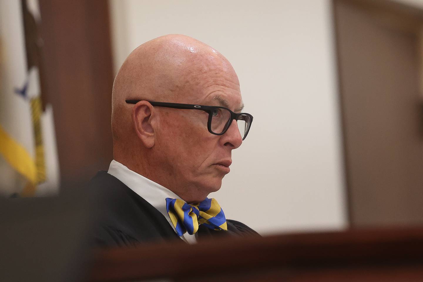 Kendall County Judge Rober Pilmer listens to defense lawyer Jeff Tomczak at a pre-trial hearing for his client retired Joliet police sergeant Javier Esqueda at the Kendall County courthouse on Tuesday, July 9, 2024 in Yorkville. Esqueda is charged with official misconduct for accessing and leaking the police squad video of the arrest of Eric Lurry, 37, who died following his arrest on drug charges in January 2020.