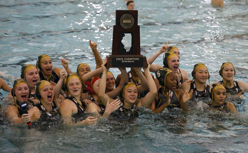 Stevenson celebrates their victory during the IHSA State Finals of the Girls Water Polo Saturday, May 24, 2025 at Stevenson High School in Lincolnshire.