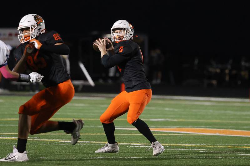 Plainfield East’s Hugh Callaghan looks to pass against Joliet Central on Oct. 4, 20234 in Plainfield.