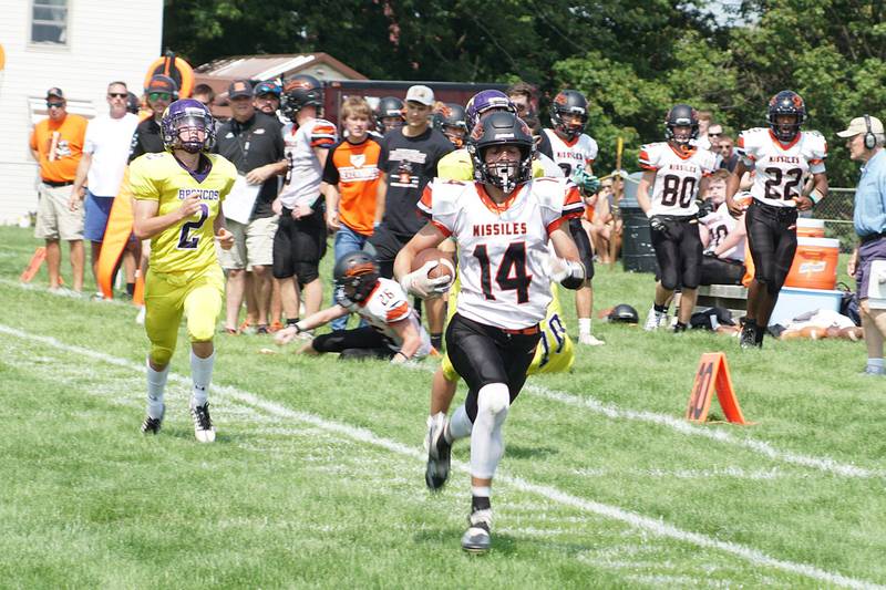 Milledgeville's Kacen Johnson returns a punt return for a touchdown Saturday, Aug. 27, 2022 against Orangeville.