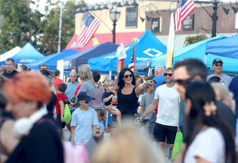 Crowds gather on Williams Street as part of National Night Out activities in downtown Crystal Lake on Thursday, Aug. 7, 2025.