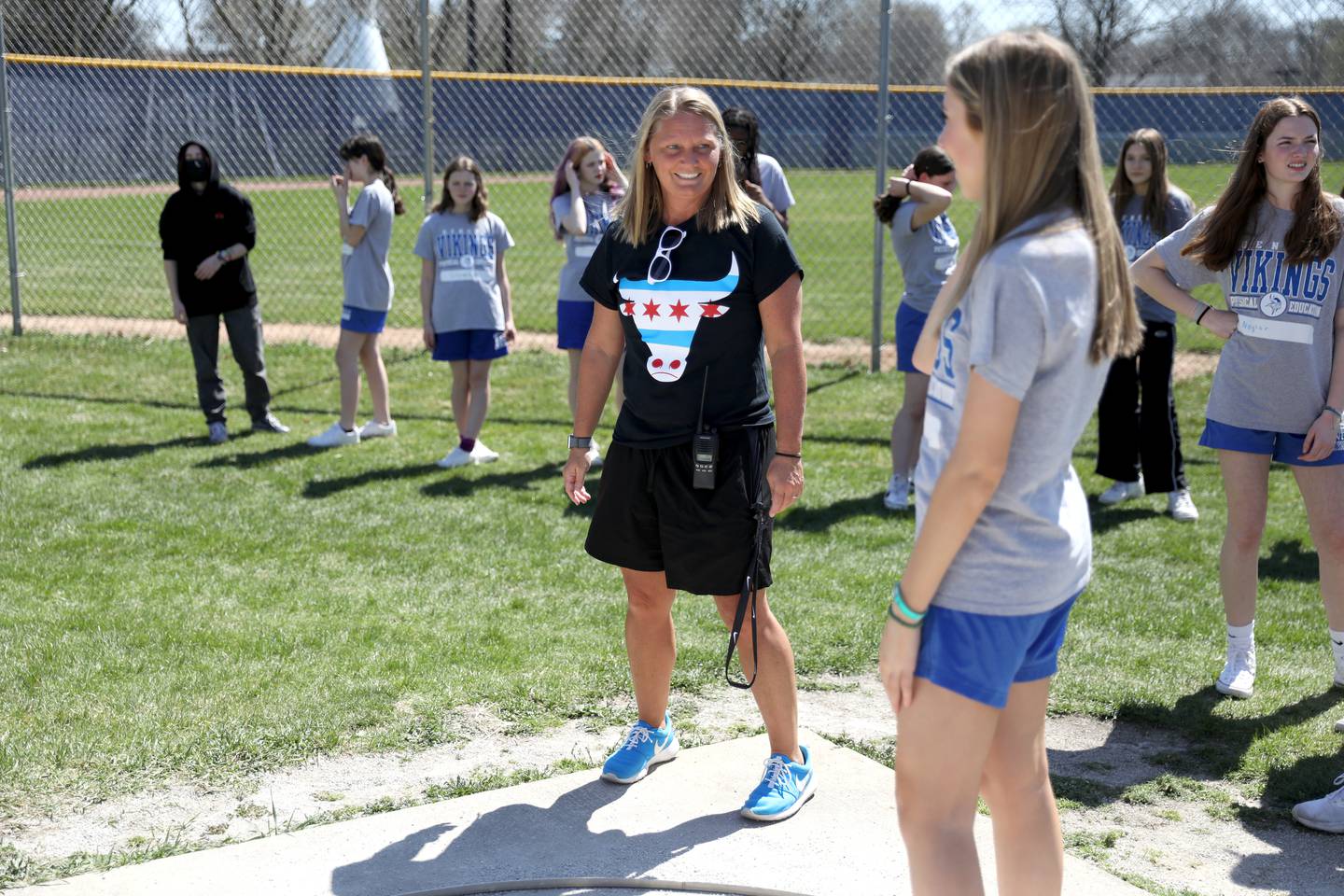 Sarah Meadows teaches a segment on shot put during a physical education class at Geneva High School. Meadows is also the head coach of Geneva’s girls varsity basketball team.