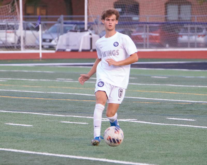 Geneva's Xavier Ebert kicks the ball downfield against St. Charles North on Tuesday, Sept. 9,2025 in St. Charles.