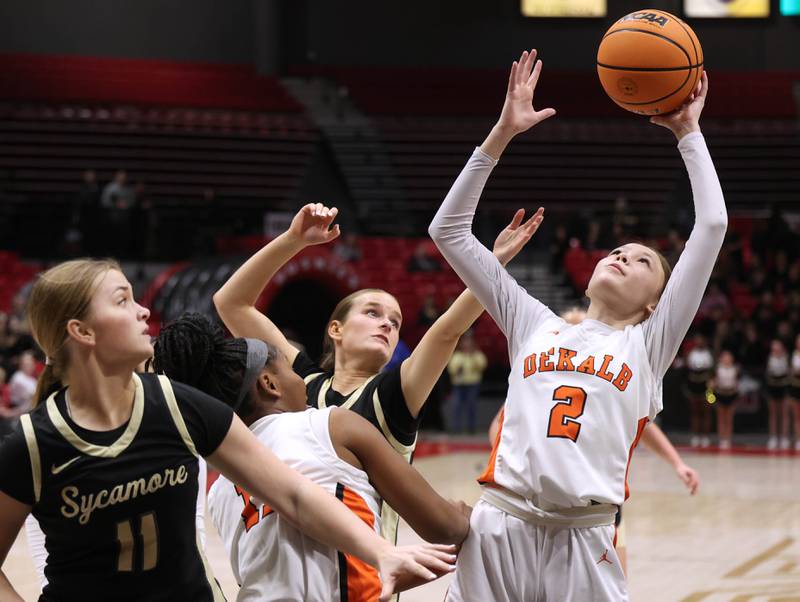 DeKalb's Emma Craig grabs a rebound Friday, Jan. 30, 2026, during their game against Sycamore in the FNBO Challenge in the Convocation Center at Northern Illinois University in DeKalb.