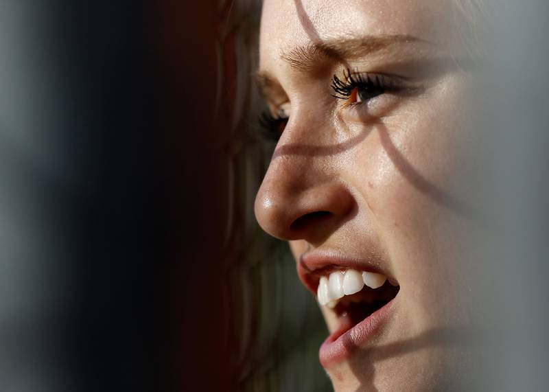 Huntley pitch Layla Olson cheers for her teammates as they score runs during a Fox Valley Conference softball game against Crystal Lake Central on April 7, 2026, at Crystal Lake Central High School.