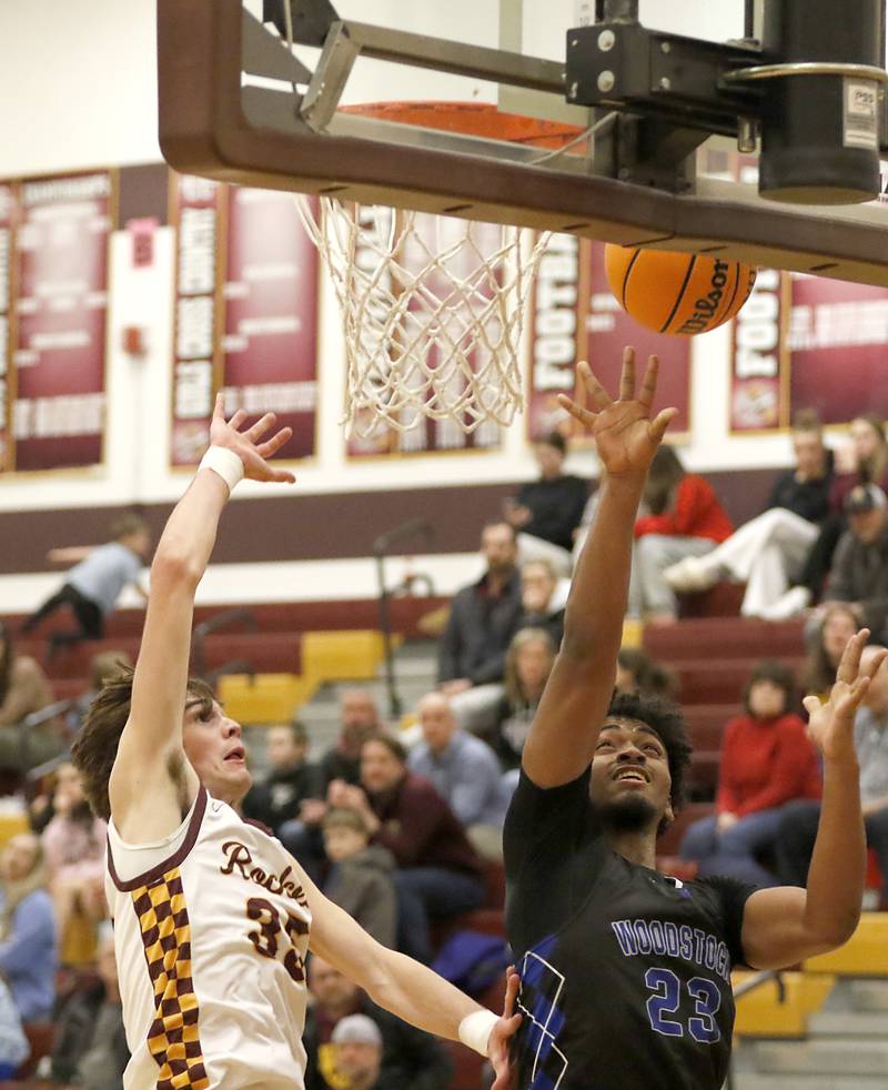 Woodstock's Anthony Grzetic shoots the ball in front of Richmond-Burton's Jace Nelson during a Kishwaukee River Conference basketball game on Wednesday, Feb. 5, 2025, at Richmond-Burton High School.