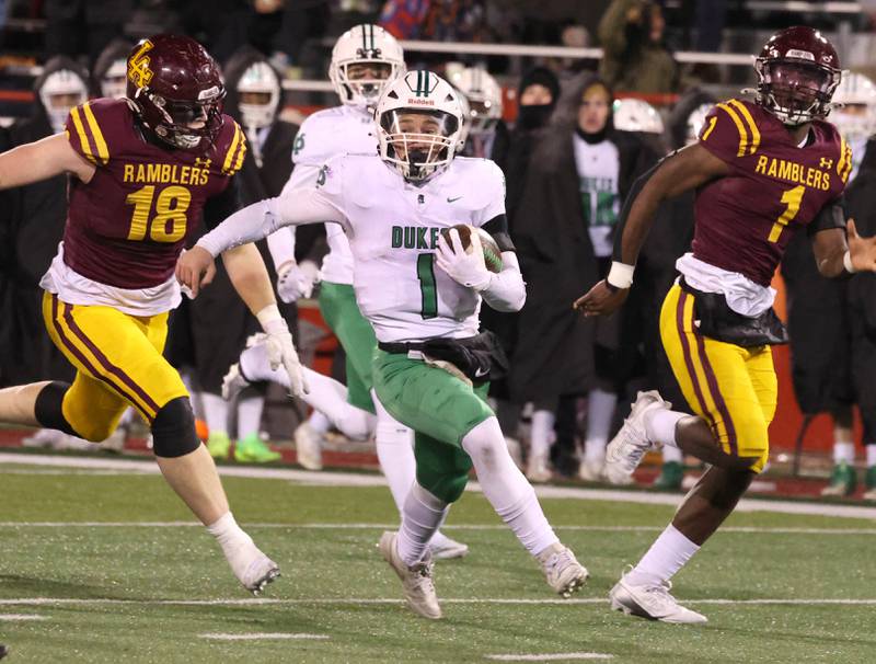 York’s Bruno Massel is pursued by Loyola Academy's Tommy Ghislandi (left) and Donovan Robinson during their Class 8A state championship game Saturday, Nov. 30, 2024, in Hancock Stadium at Illinois State University in Normal.