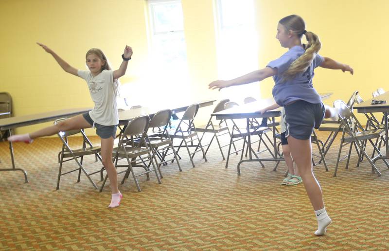 Ryen Pettet and Trinity Frawley rehearse a scene for the upcoming musical Annie Jr. on Tuesday, June 24, 2025 at the First United Methodist Church in Henry. The show will be presented July 25-27 at the River Valley Players theater in Henry, .