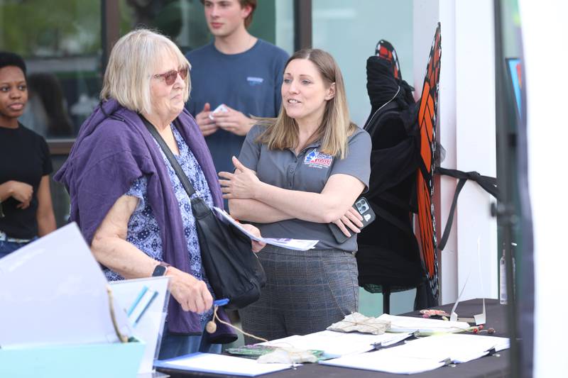 State Sen. Rachel Ventura, D-Joliet, talks with a resident at the Green Escape Earth Day Event on Wednesday, April 22, 2026 in Joliet.
