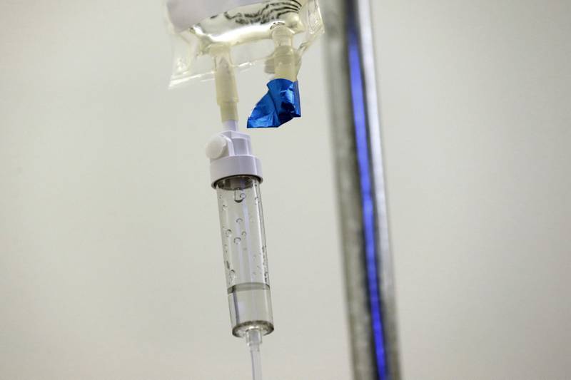 FILE - In this May 25, 2017 file photo, chemotherapy drugs are administered to a patient at a hospital in Chapel Hill, N.C. Scaling back treatment in some cancers — ovarian, esophageal and Hodgkin lymphoma — can make life easier for patients without compromising outcomes, doctors reported at the American Society of Clinical Oncology annual meeting in early June 2024. (AP Photo/Gerry Broome, File)