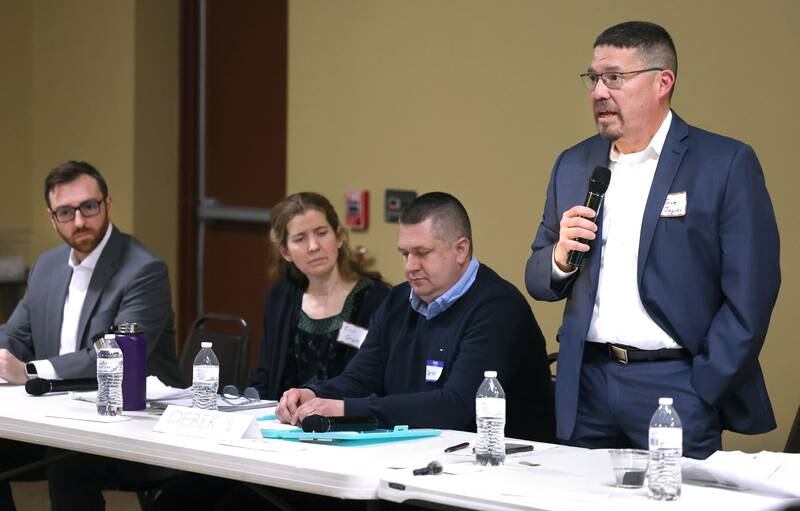 District 428 School Board candidate Jose Jaques speaks as other candidates listen in Thursday, March 20, 2025, during the DeKalb Area Rental Association and DeKalb Area Builders Association School Board Candidates Forum at Faranda's Banquets in DeKalb.