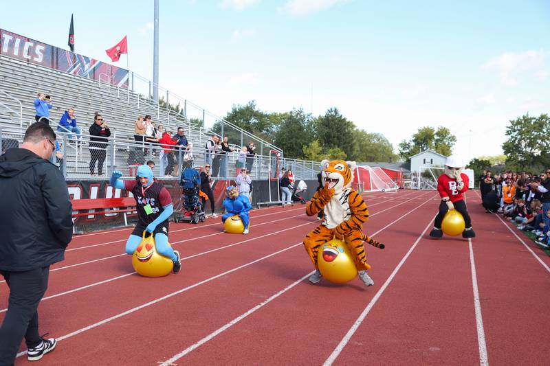 Mascots from Kankakee, Peotone, Herscher, Manteno and Bradley-Bourbonnais compete in a race during the annual Boilermaker Games, hosted by the Best Buddies club on Wednesday, Oct. 8, 2025.