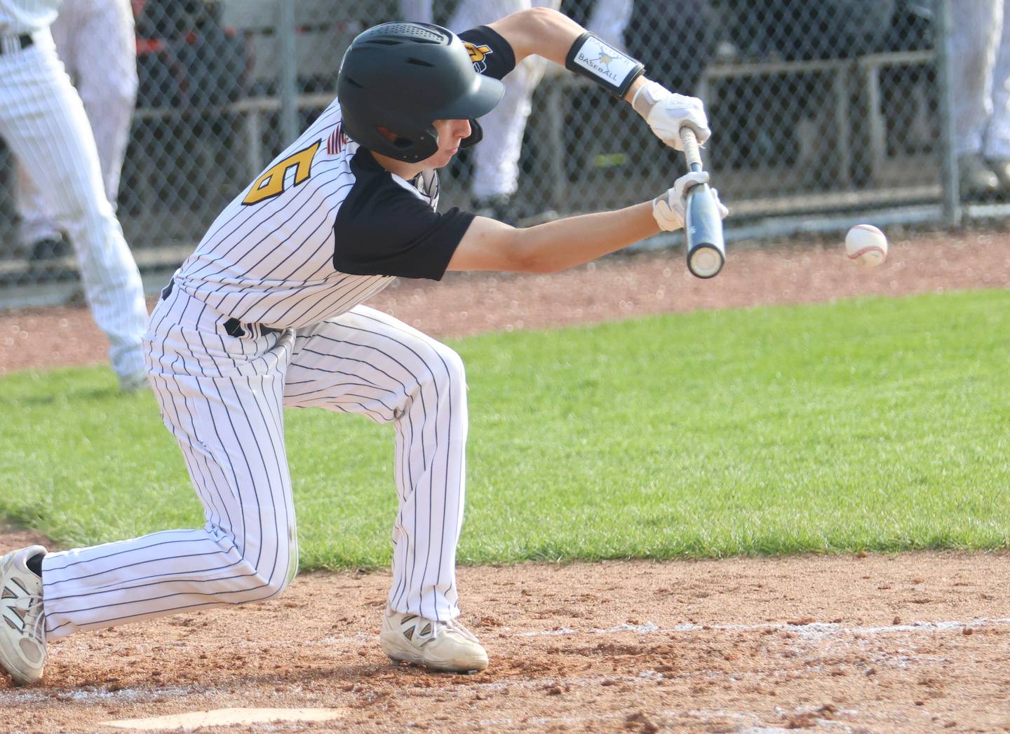 Putnam County's Maddox Poole lays down a bunt against Mendota on Friday, May 8, 2026 at Putnam County High School.