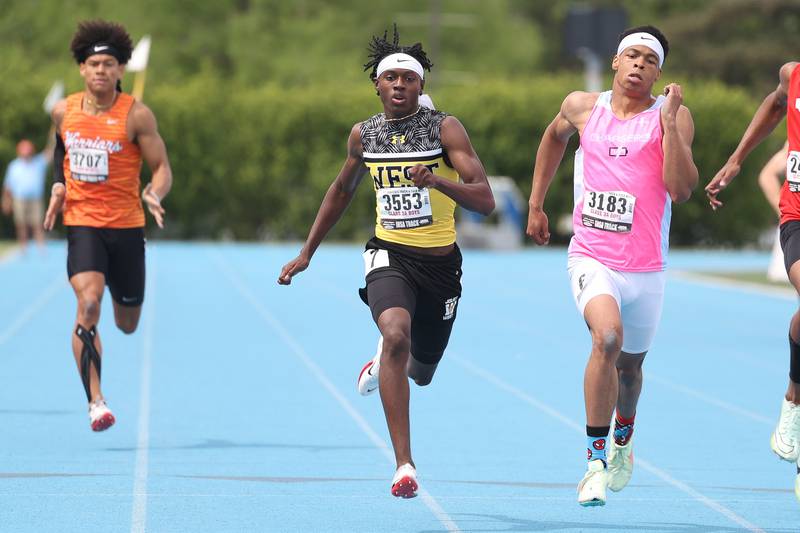 Joliet West’s Billy Bailey Jr. (center) races to a second-place finish in the Class 3A 400-meter dash at the IHSA State Finals on Saturday, May 27, 2023, in Charleston.Joliet West’s Billy Bailey Jr, center, took second to Centennial’s Daniel Lacy, right, by .005 of a second in the Class 3A 400 Meter Dash State Finals on Saturday, May 27, 2023 in Charleston.
