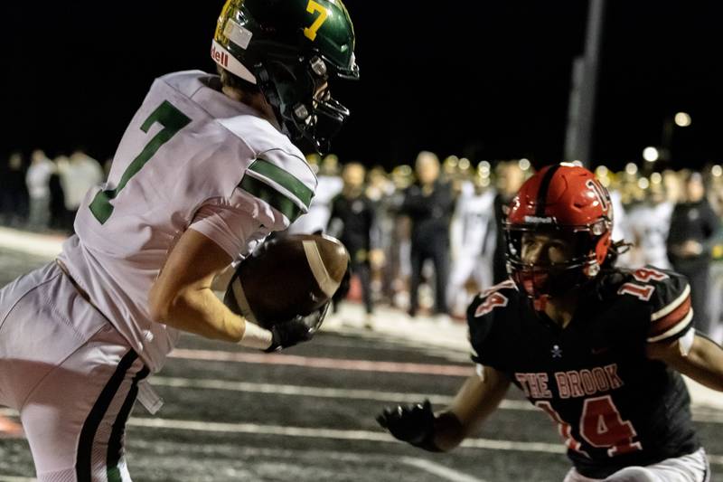 Fremd's Ben Riddle scores a touchdown during an 8A varsity football playoff game against Bolingbrook at Bolingbrook on Nov. 15, 2025.