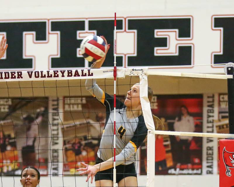 Joliet West's Lina Govoni (4) spikes the ball during Class 4A Bolingbrook Sectional semifinal match between Joliet West at Oswego.  Nov 5, 2024  in Bolingbrook.