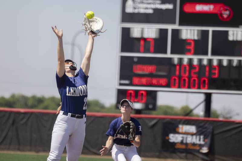 A ball tips just off the top of Lemont’s Avaree Taylor’s glove for a Benet Academy hit Friday, June 9, 2023 in the class 3A state softball semifinal.