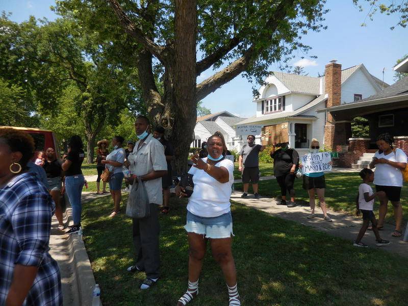 Protesters gathered outside the home of Joliet Mayor Bob O'Dekirk Sunday.
