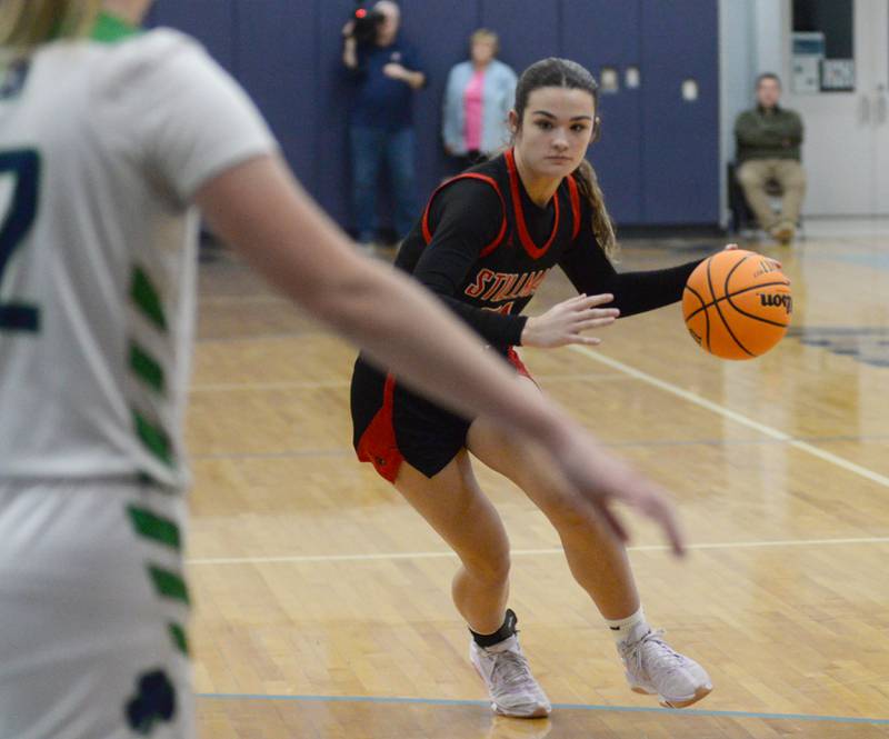 Stillman Valley's Emma Withers prepares to drive to the basket against Peoria Notre Dame at the 2A Super-Sectional on Monday, March 3, 2025 at Bureau Valley High School in Manlius.