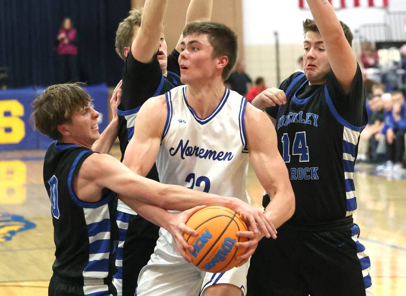 Newark's Cody Kulbartz is surrounded by three Hinckley-Big Rock defenders Friday, Feb. 6, 2026, during their Little 10 Conference third place game at Somonauk High School.