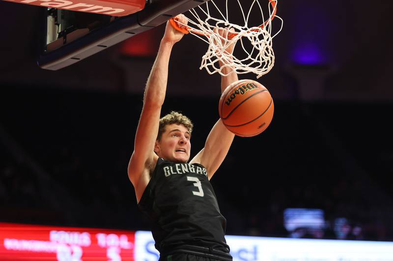 Glenbard West’s Caden Pierce gets the uncontested dunk against Bolingbrook in the Class 4A semifinal at State Farm Center in Champaign. Friday, Mar. 11, 2022, in Champaign.