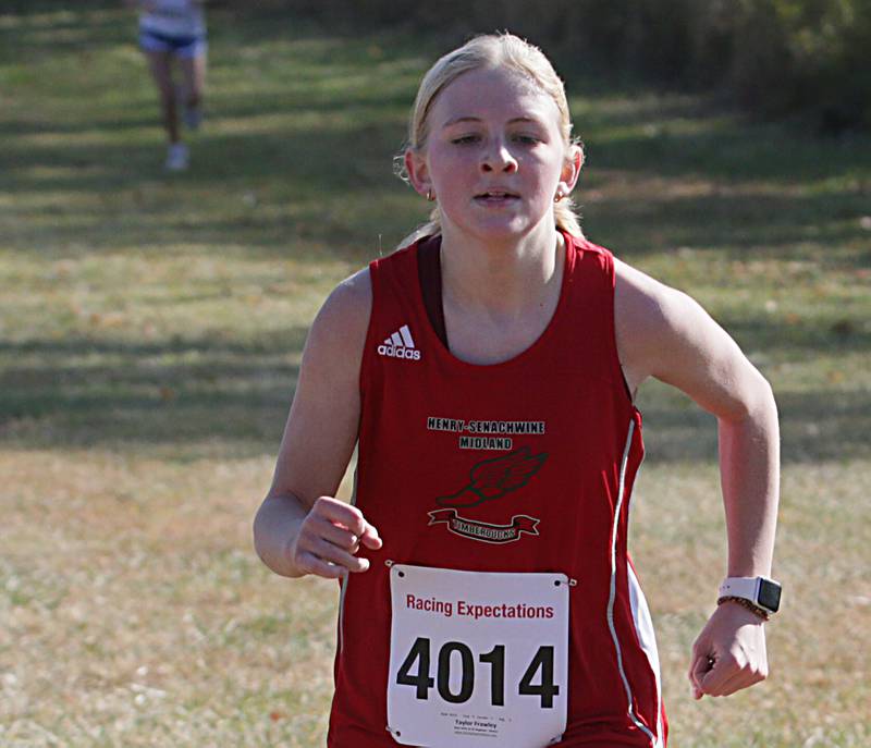 Henry-Senachwine's Taylor Frawley runs in the Class 1A Regional Cross Country gils race on Saturday, Oct. 22, 2022 at the Seneca FFA Farm in Marseilles.