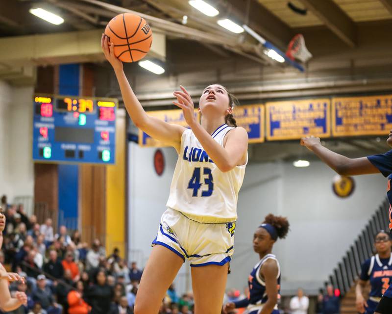 Lyon's Emma O"brien (43) puts in a layup during their Class 4A Lyons Sectional semifinal basketball game between Lyons vs Young. Feb 25, 2025 in La Grange.