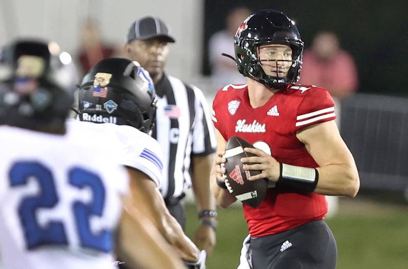 Northern Illinois Huskies quarterback Rocky Lombardi looks for a receiver in the Eastern Illinois secondary during their game Thursday, Sept. 1, 2022, in Huskie Stadium at NIU.