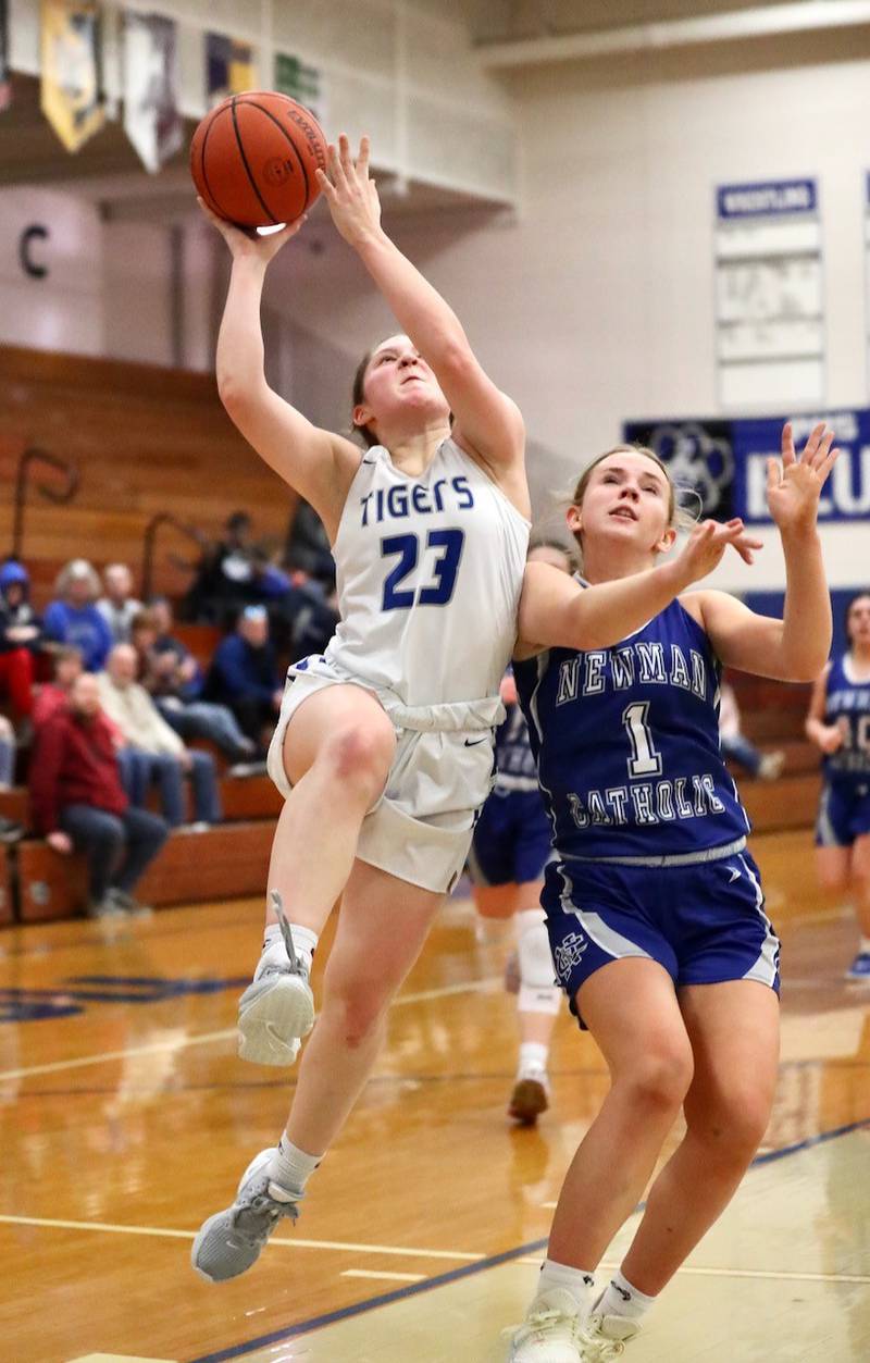 Princeton's Miyah Fox shoots over Newman's Jess Johns Monday night at Prouty Gym.