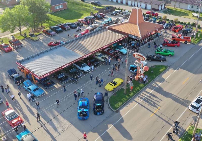 An aerial view of the Kick off Cruise on Saturday, April 25, 2026 at Root Beer Stand in Oglesby. Donations from the cruise helped fund the Kids Hot Rod Camp held June 15-19 at "The Rock" Walnut Community Bible Church in Walnut. The camp is open to kids ages 12-17.