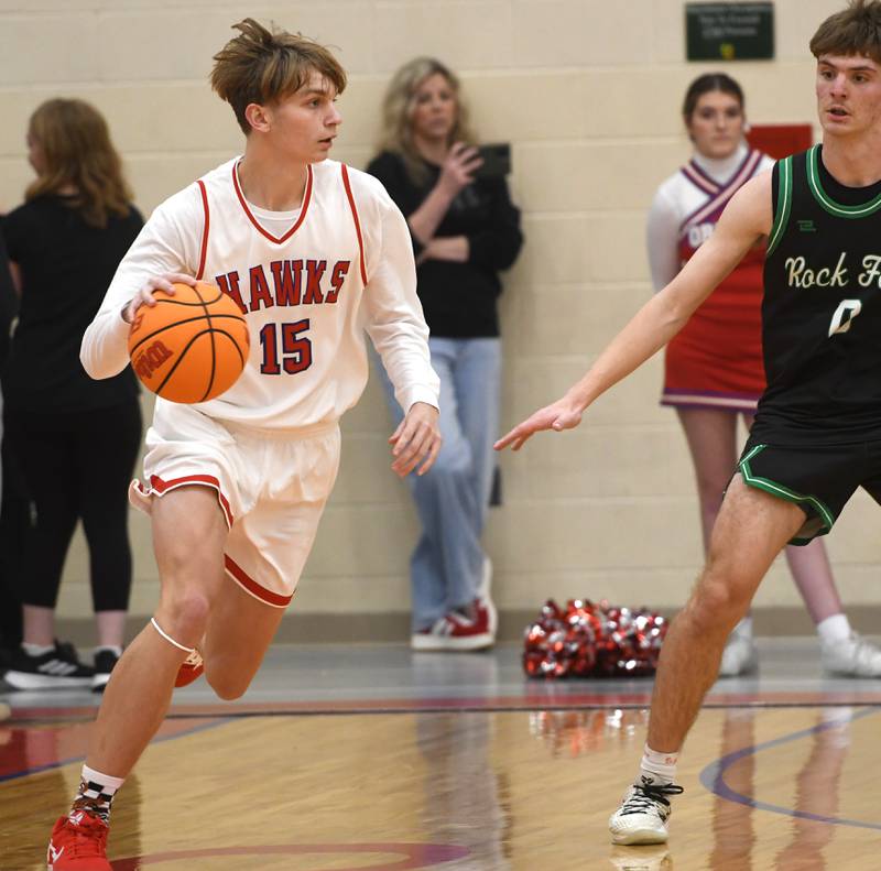 Oregon's Brian Wallace (15) dribbles against Rock Falls on Friday, Jan. 9, 2026 at the Blackhawk Center in Oregon.