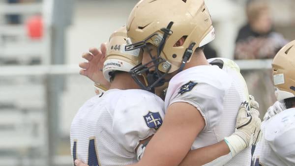 Photos: GCMS dominates Marquette in Class 1A football playoffs