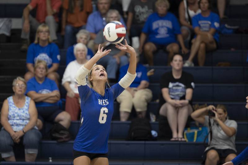 Newman’s Brooklyn Smith sets the ball against Kewanee Tuesday, Sept. 16, 2025.