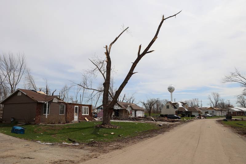 Homes along Strasma East Drive in Aroma Township are shown on April 8, 2026, nearly one month after the EF-3 tornado.