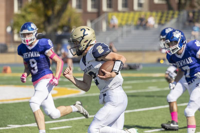 Mercer County QB John Baldwin picks up big yards against Newman Saturday, October 4, 2025.