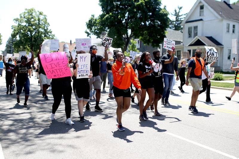 Prevail Bonga and Kessie Olekanma lead a Black Lives Matter peaceful protest and march was held in Downers Grove on June 7 in response to the killing of George Floyd, an unarmed black man while in police custody in Minneapolis last month.