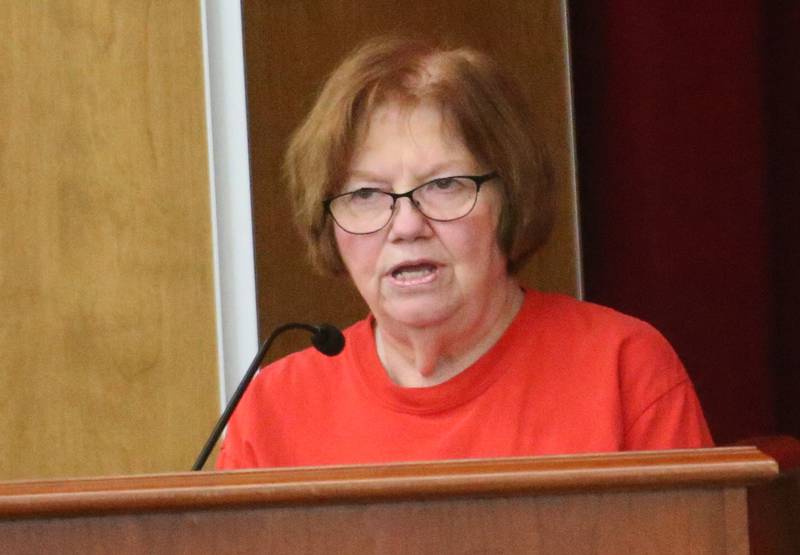 Darlene Halm speaks to the Illinois Health Facilities and Services Review Board during a public hearing regarding OSF St. Elizabeth Hospital's plans to reduce services on Tuesday, June 10, at Central Intermediate School in Ottawa.
