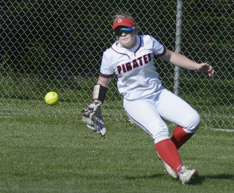 Ottawa’s Reese Purcell stops to cut off a Sycamore hit to right center field Wednesday at Ottawa.