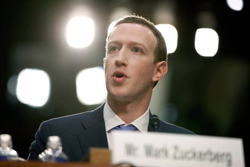FILE - Facebook CEO Mark Zuckerberg testifies before a joint hearing of the Commerce and Judiciary Committees on Capitol Hill in Washington, April 10, 2018.  (AP Photo/Alex Brandon, File)