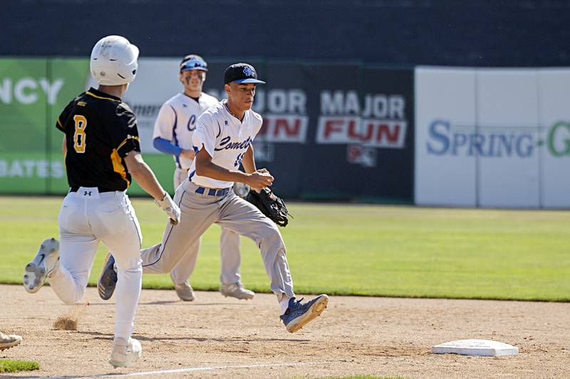 Newman’s Isaiah Williams races a Goreville player to the bag Saturday, June 3, 2023 during the IHSA class 1A third place baseball game.