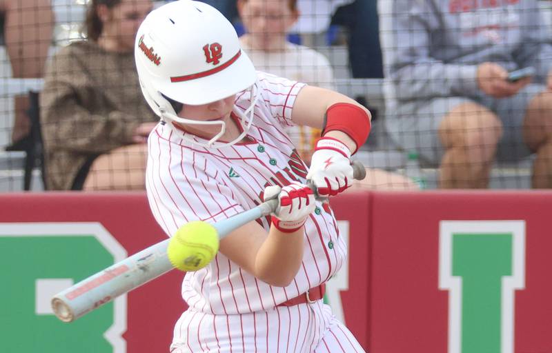 L-P's MaKenzie Chamberlain makes contact with the ball against Morton on Friday, March 20, 2026 at the L-P Athletic Complex in La Salle.