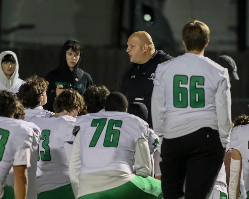 York's head coach Don Gelsomino pumps up the team before Class 8A second- round football game between York at Oswego on Friday, Nov 8, 2024  in Oswego.