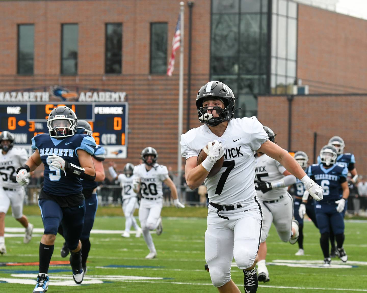 Fenwick's Tommy Thies (7) runs the ball in for a touchdown on Saturday Nov. 22, 2025, while taking on Nazareth Academy during the 6A semifinals game held at Nazareth Academy High School in La Grange Park.