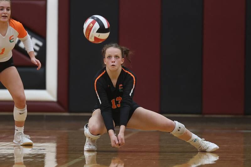 Plainfield East’s Ella Gierat digs out a shot against Plainfield North on Thursday night.