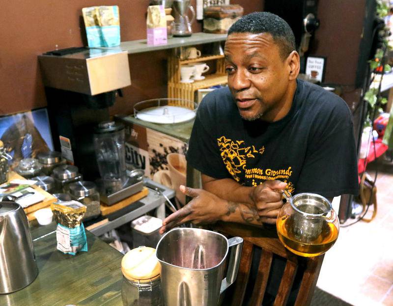 Jeff Foster, 47, owner of Common Grounds, talks about what he thinks about recreational marijuana legalization Friday at his establishment in DeKalb.