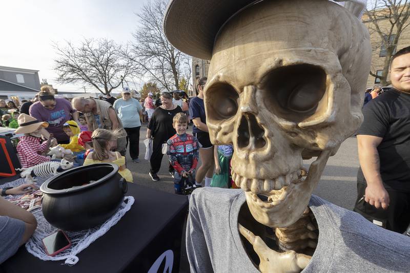 A spooky skeleton at the Sterling Park District boot greets kids looking for candy Tuesday, Oct. 29, 2024, in Sterling.