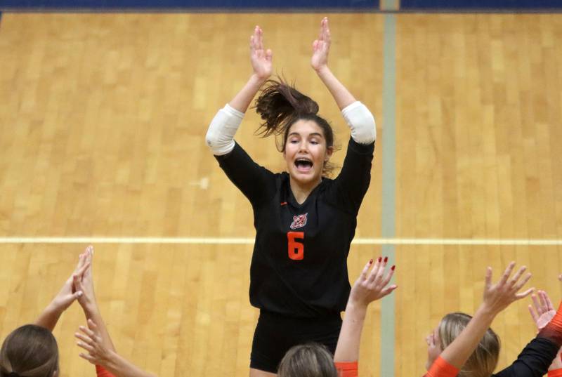 Crystal Lake Central’s Clara Dobbertin celebrates a Tiger point against Woodstock North in IHSA girls volleyball Class 3A Regional action at Woodstock High School in Woodstock on Thursday, October 30, 2025.