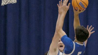 Photos: Newman Central Catholic hosts Princeton in boys basketball