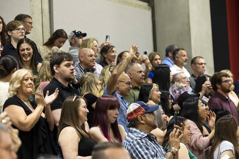 Loved ones wave to their graduates Friday, May 9, 2025, at Sauk Valley Community College’s commencement ceremony.