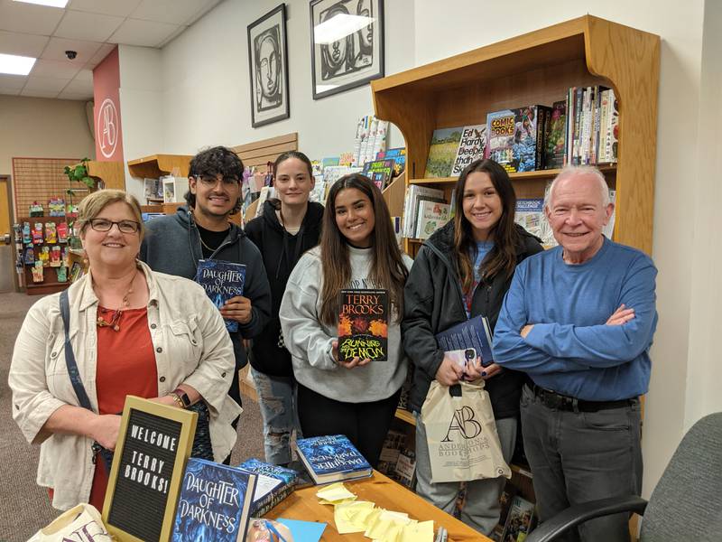 Rock Falls literature instructor Kelly Schaefer and students Raul Garcia-Fernandez, Savanna Wood-Kendrick, Ariana Diaz, and Makenna Arickz meet with author Terry Brooks during a book signing in Naperville on Oct. 11.